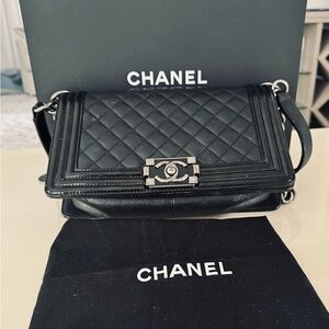 CHANEL Black Crossbody Bag with Quilted Leather and Silver Hardware